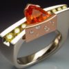 White gold ring with Spessartite Garnet and Diamonds