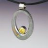 Comet Ison Pendant in Gibeon Meteorite with Yellow and Green Diamonds