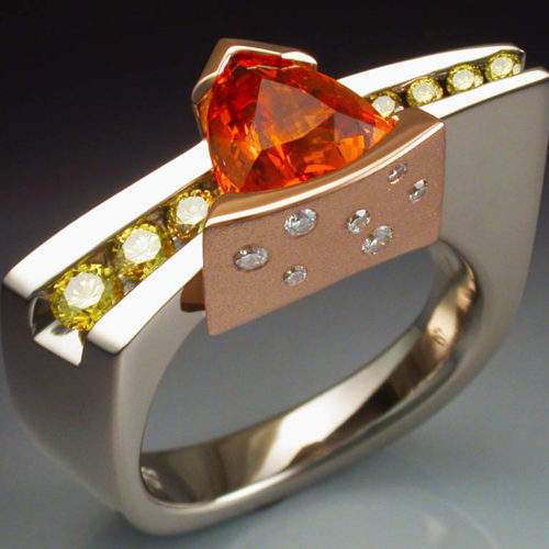 White gold ring with Spessartite Garnet and Diamonds