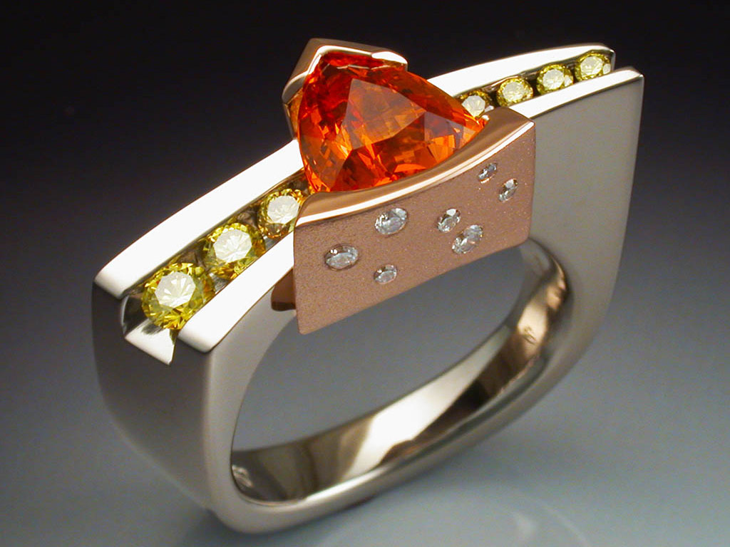 White gold ring with Spessartite Garnet and Diamonds